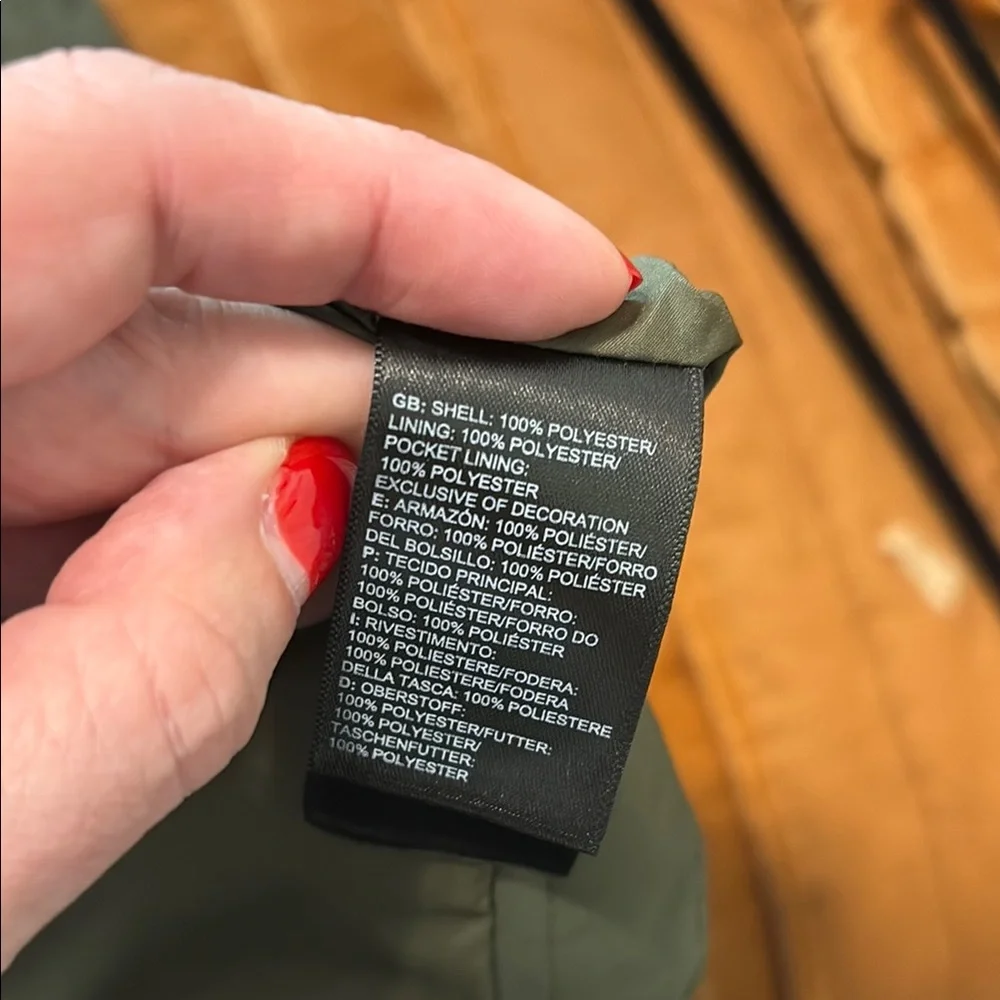 The North Face Green Dry Vent Rain Coat with Sleek Silhouette - Picture 10 of 10
